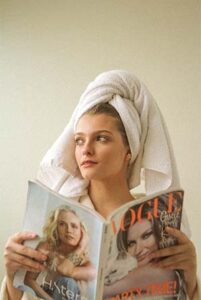 woman reading magazine