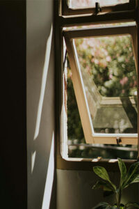 Open window with sunlight pouring in